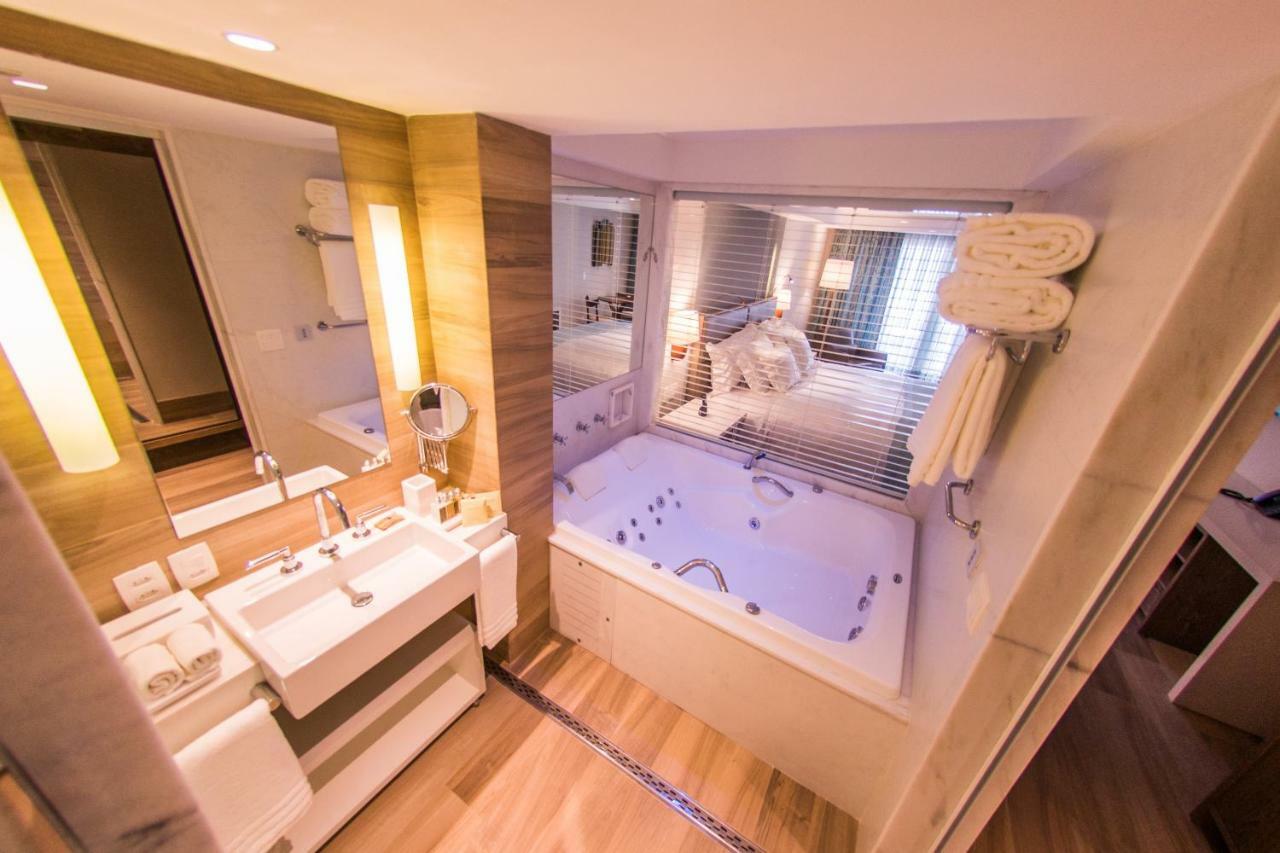 Vogal Luxury Beach Hotel&SPA Natal Exterior foto A bathroom in a hotel