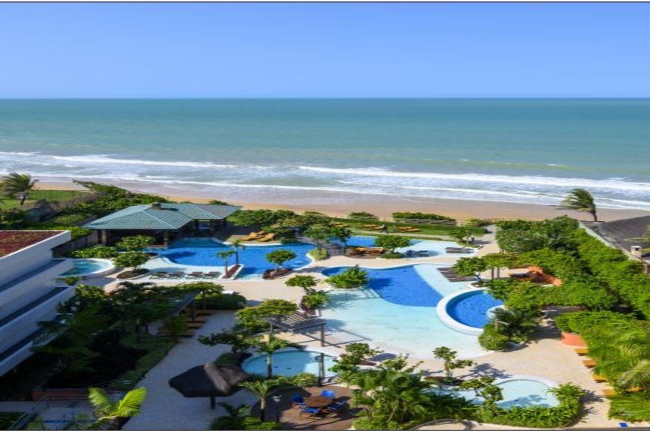 Vogal Luxury Beach Hotel&SPA Natal Exterior foto The beach at the resort
